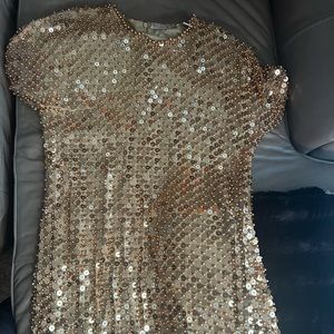 Women size 10-14 gold sequins dress. In great condition priced to sell!